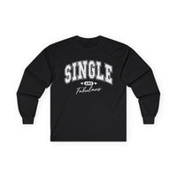Black long-sleeve Valentine's shirt designed for those who embrace their single status with confidence. The front features white, bold, distressed collegiate-style lettering that reads "SINGLE AND Fabulous," with small heart accents adding a playful touch. This Valentine's shirt for singles is perfect for celebrating self-love and independence in a stylish and empowering way.